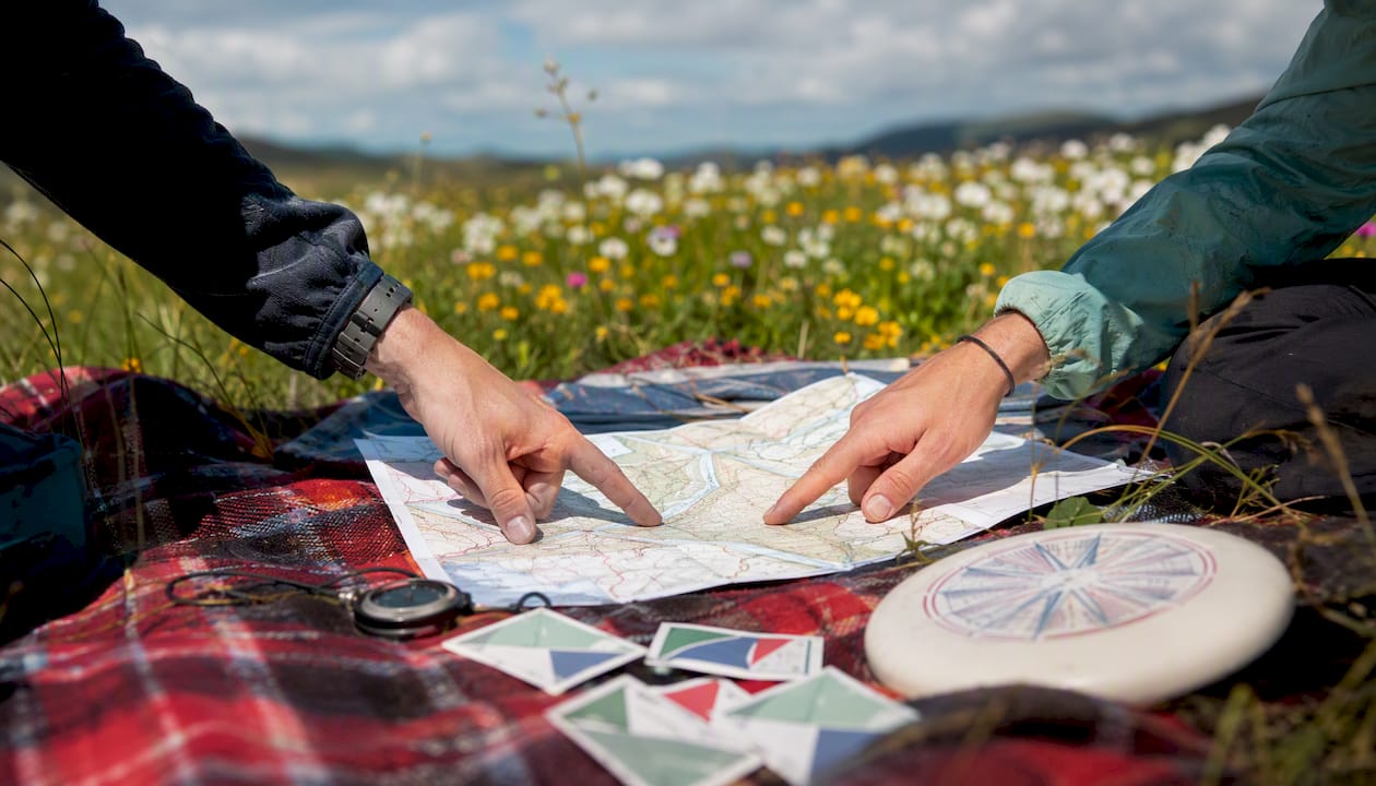 Hands planning team activities outdoors