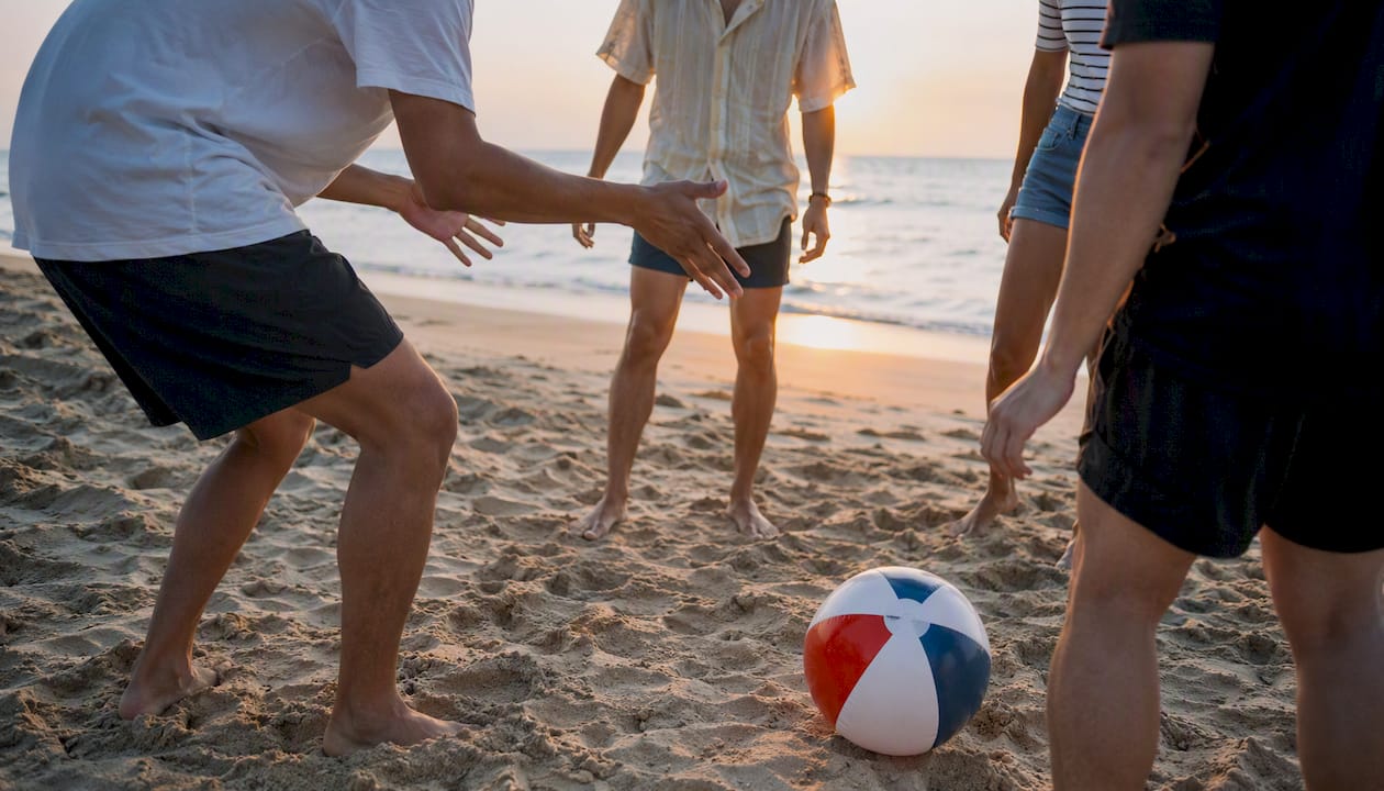 Person gesturing during movement icebreaker game outdoors