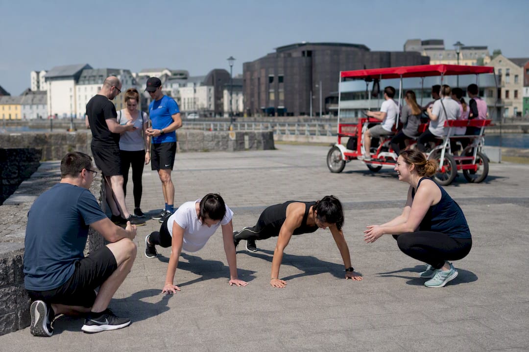 Groups engaging in various custom activities outdoors