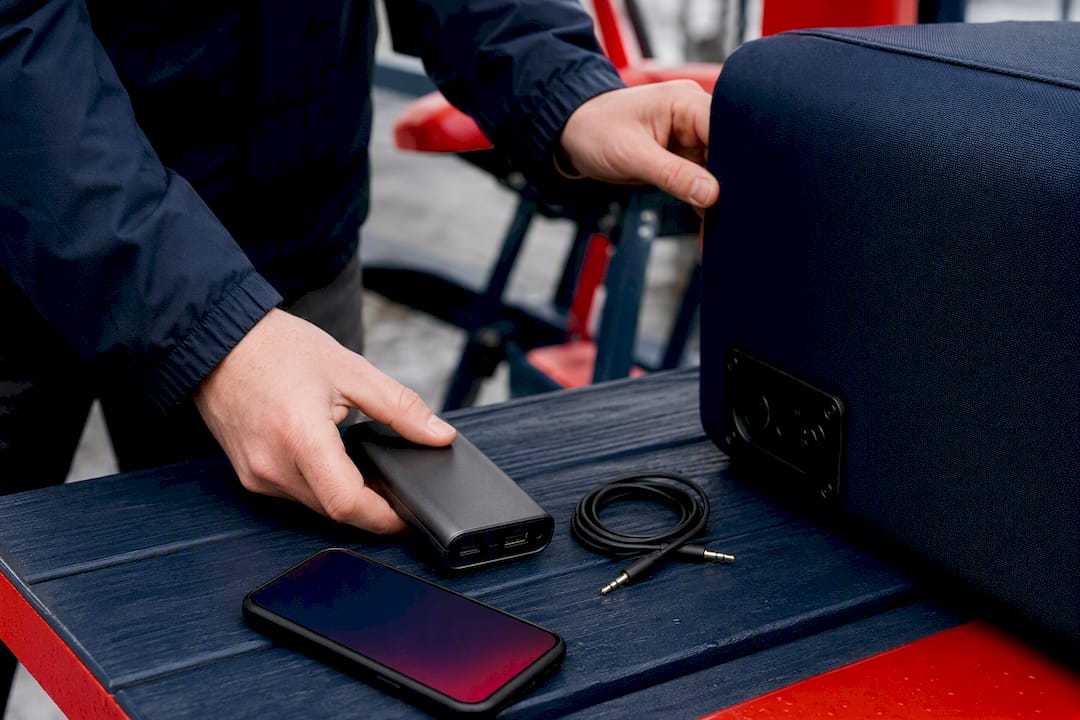 Power bank and aux cable for party bike audio