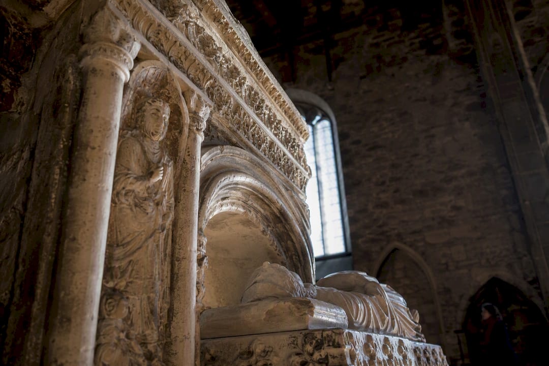Carved medieval stonework inside St Nicholas Church